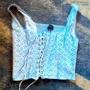 majorelle revolve crop corset top with lace detail in light blue